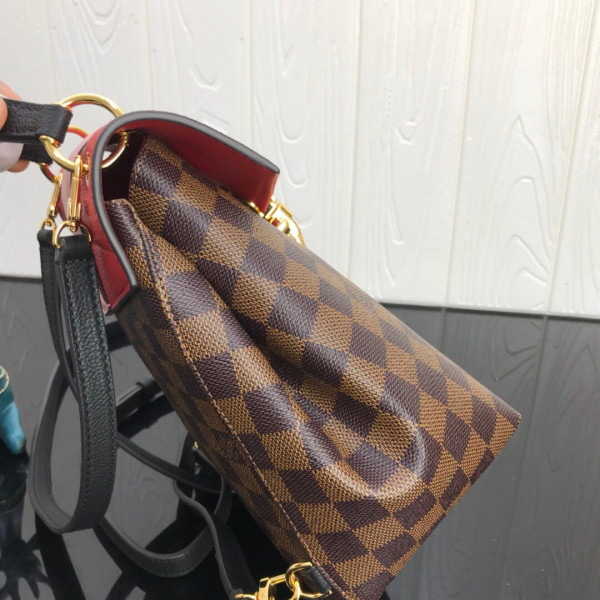 l**is V*t*n clapton backpack
